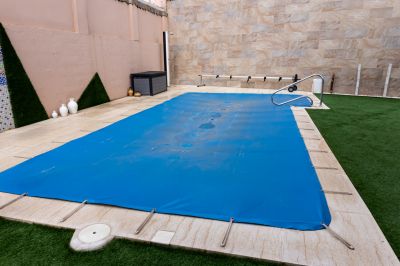 Reduce Energy Costs and Save Water with Swimming Pool Cover Installation!